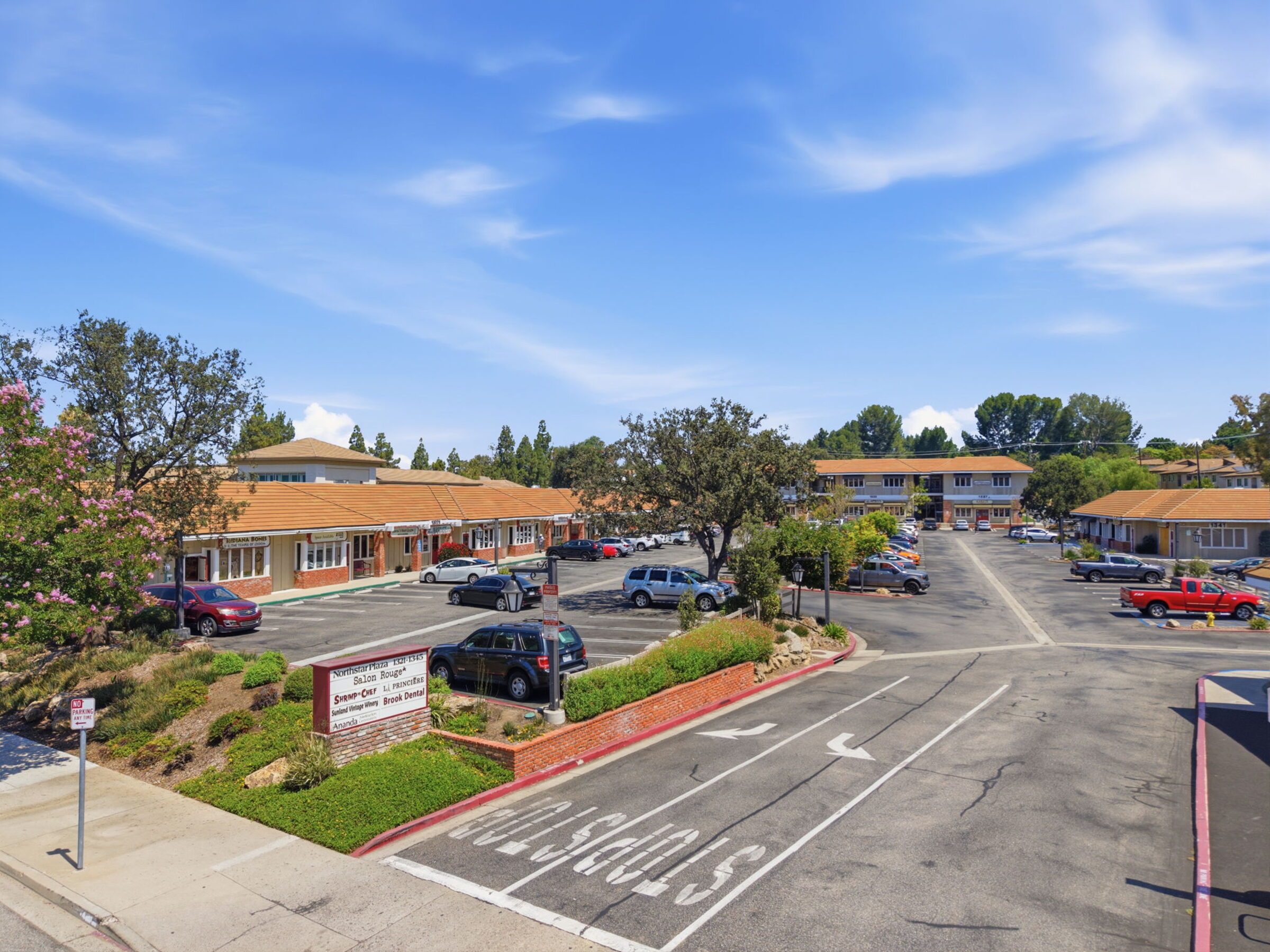 Aerial view of Northstar Plaza showing four buildings around central parking court